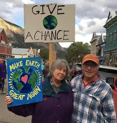 Neighbors gather along Elk Avenue for a community climate march